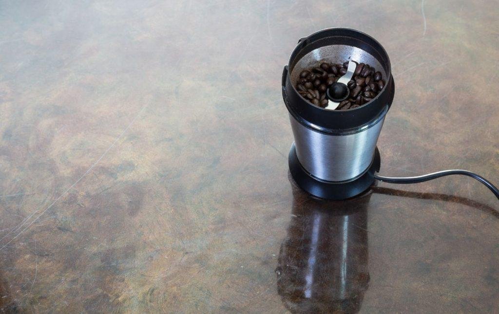 electric coffee grinder on table