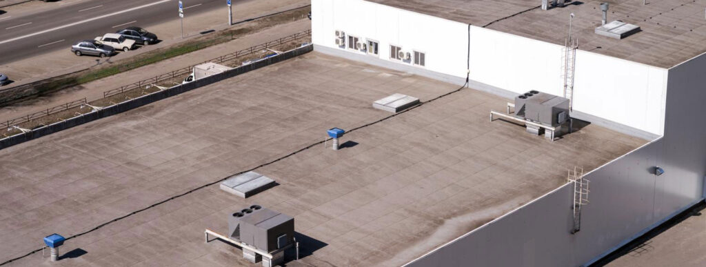 commercial building rooftop with AC units in Tucson