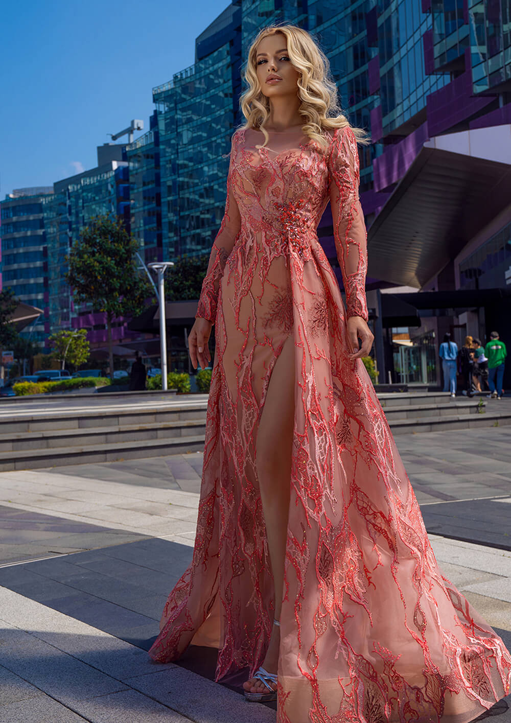 Long sleeves patterned evening dress with side slit