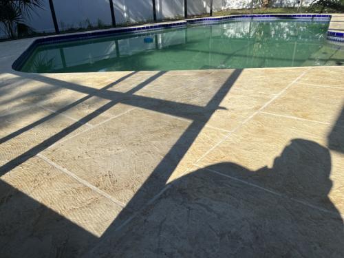 resurfaced concrete around the pool