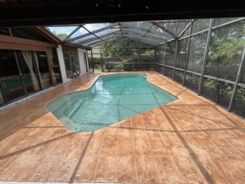 resurfaced concrete in pool area