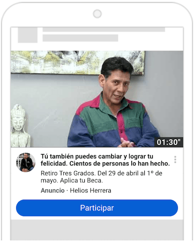 Un teléfono móvil con un hombre con camisa azul.