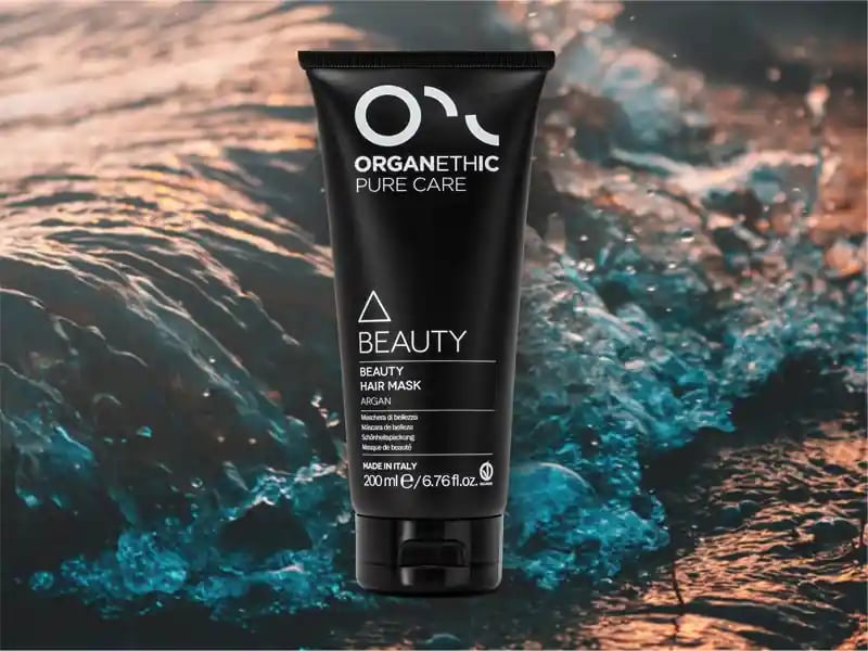 Organethic Pure Care Beauty Mask for hair, with sea in the background.