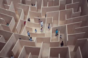 Photo of people trying to navigate a maze